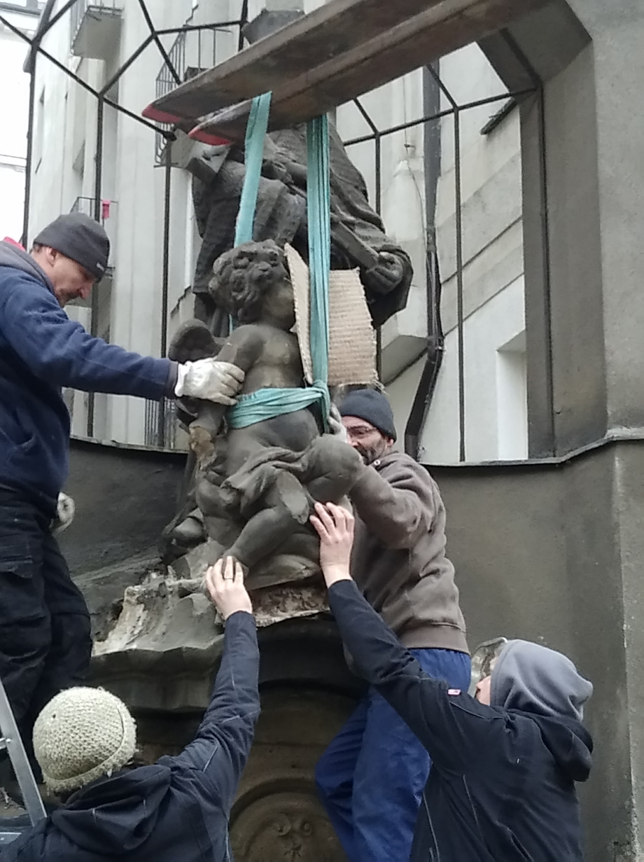 removal of the sculpture of st. John of Nepomuk from the pedestal, Spálená Street, Prague 1